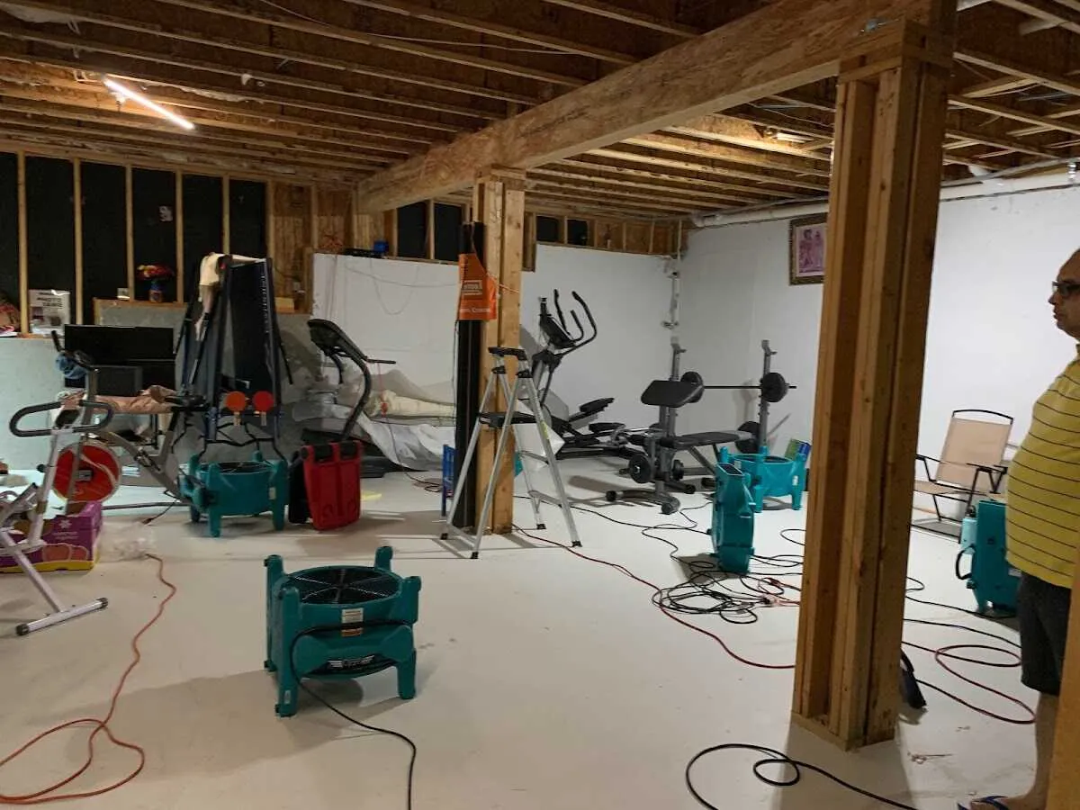 Basement drying equipment setup for Contents Cleaning & Restoration in Lake Hallie